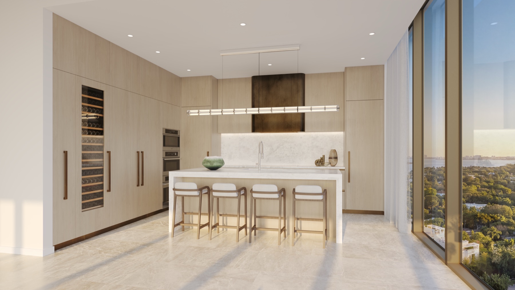 Gourmet kitchen with Gaggenau appliance package, Rockwell Group cabinetry, Kallista fixtures, natural stone waterfall island.